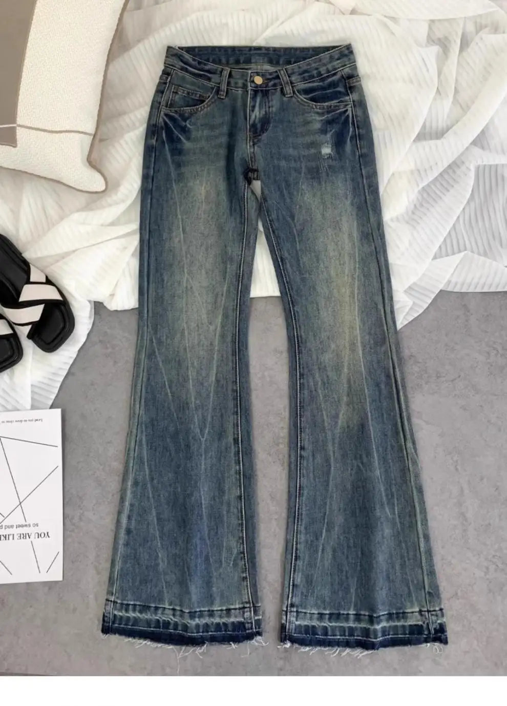 Vaqueros retro americanos de cintura baja para mujer, novedad de otoño, bordado, moda informal antigua, temperamento, pantalones ajustados con campana del Joker.