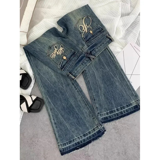 Vaqueros retro americanos de cintura baja para mujer, novedad de otoño, bordado, moda informal antigua, temperamento, pantalones ajustados con campana del Joker.