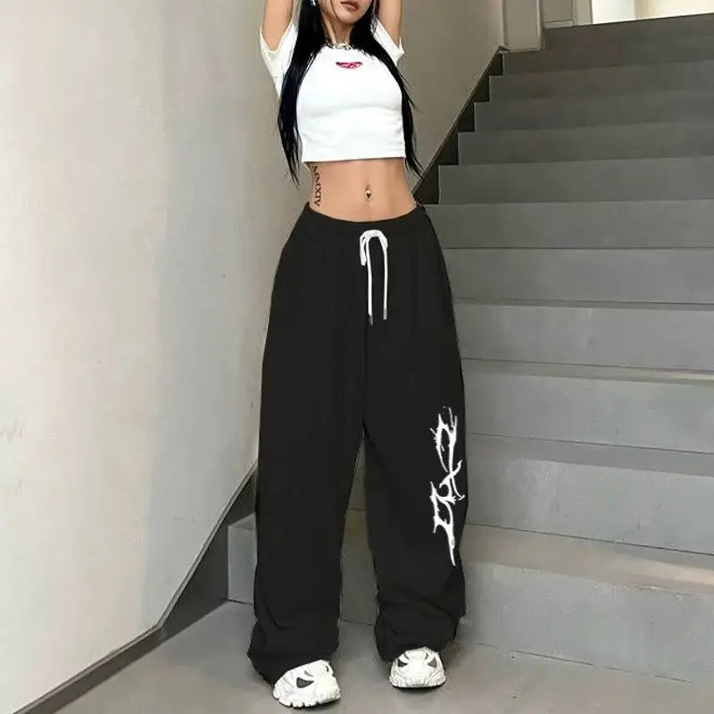 Pantalones de chándal americanos sueltos rectos Hiphop Jazz Dance algodón impreso pantalones de pierna ancha Casual estilo perezoso pantalones deportivos de Hip-hop