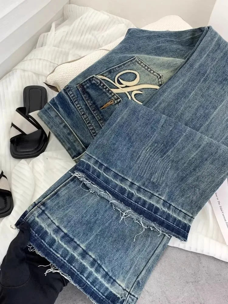 Vaqueros retro americanos de cintura baja para mujer, novedad de otoño, bordado, moda informal antigua, temperamento, pantalones ajustados con campana del Joker.