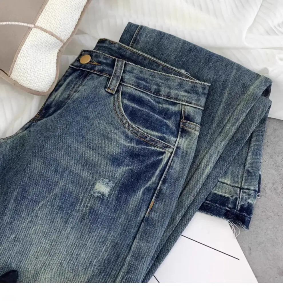 Vaqueros retro americanos de cintura baja para mujer, novedad de otoño, bordado, moda informal antigua, temperamento, pantalones ajustados con campana del Joker.