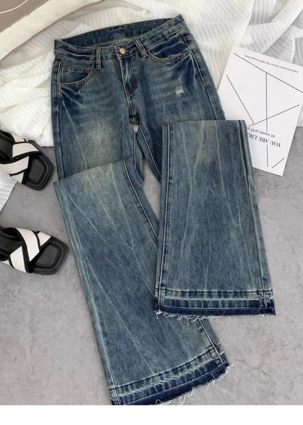 Vaqueros retro americanos de cintura baja para mujer, novedad de otoño, bordado, moda informal antigua, temperamento, pantalones ajustados con campana del Joker.