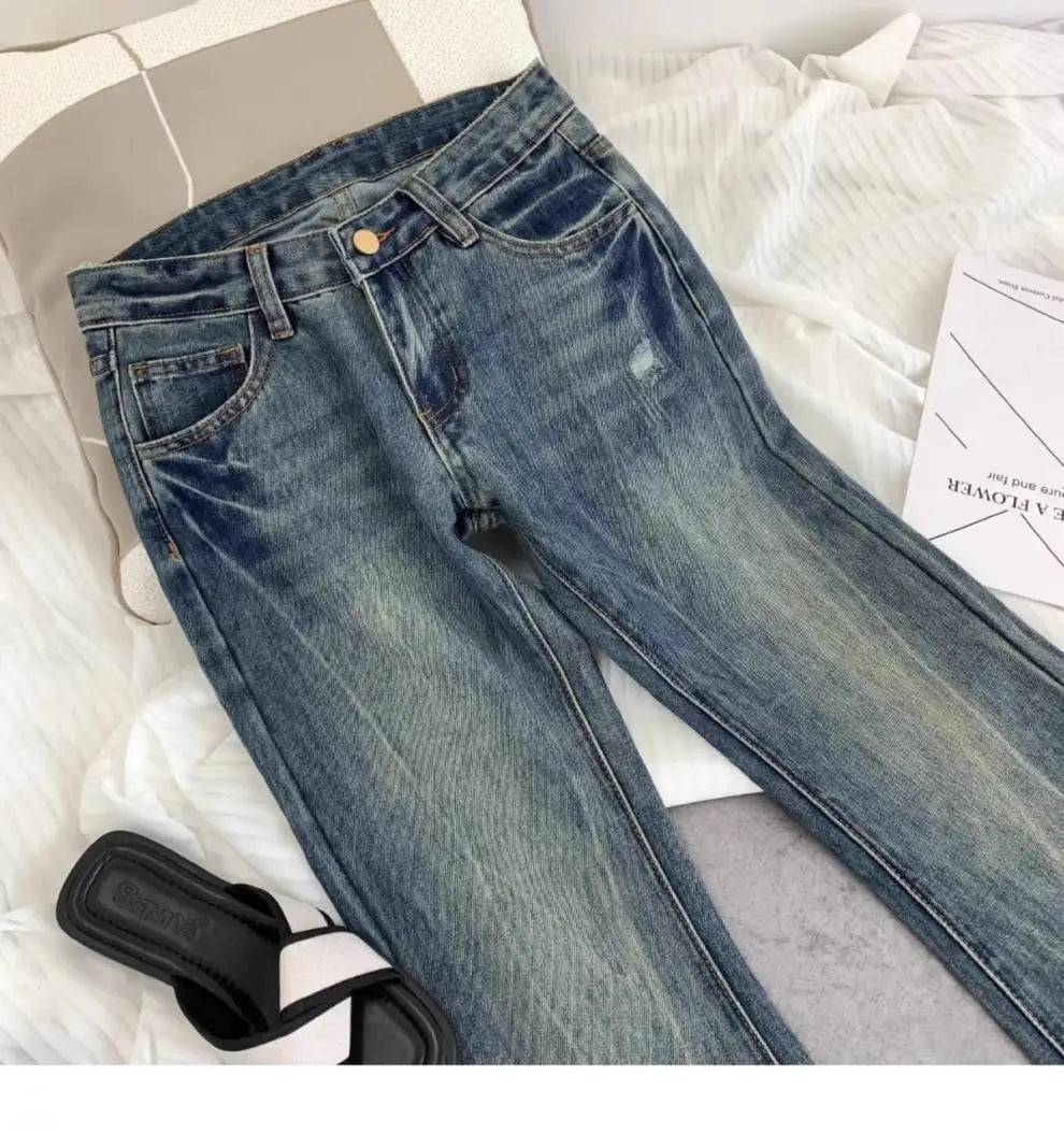 Vaqueros retro americanos de cintura baja para mujer, novedad de otoño, bordado, moda informal antigua, temperamento, pantalones ajustados con campana del Joker.