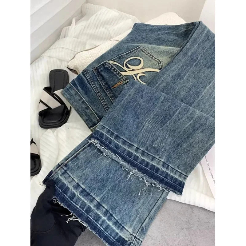 Vaqueros retro americanos de cintura baja para mujer, novedad de otoño, bordado, moda informal antigua, temperamento, pantalones ajustados con campana del Joker.