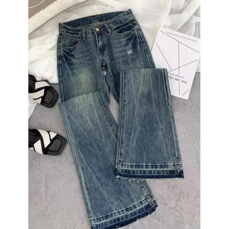 Vaqueros retro americanos de cintura baja para mujer, novedad de otoño, bordado, moda informal antigua, temperamento, pantalones ajustados con campana del Joker.