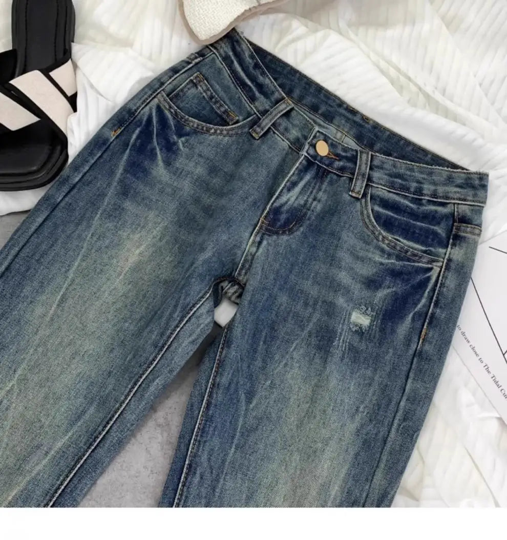 Vaqueros retro americanos de cintura baja para mujer, novedad de otoño, bordado, moda informal antigua, temperamento, pantalones ajustados con campana del Joker.
